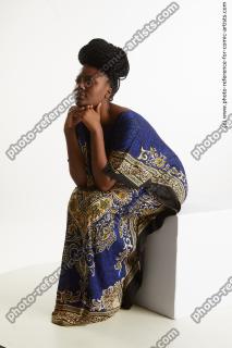 sitting african woman dina moses 02